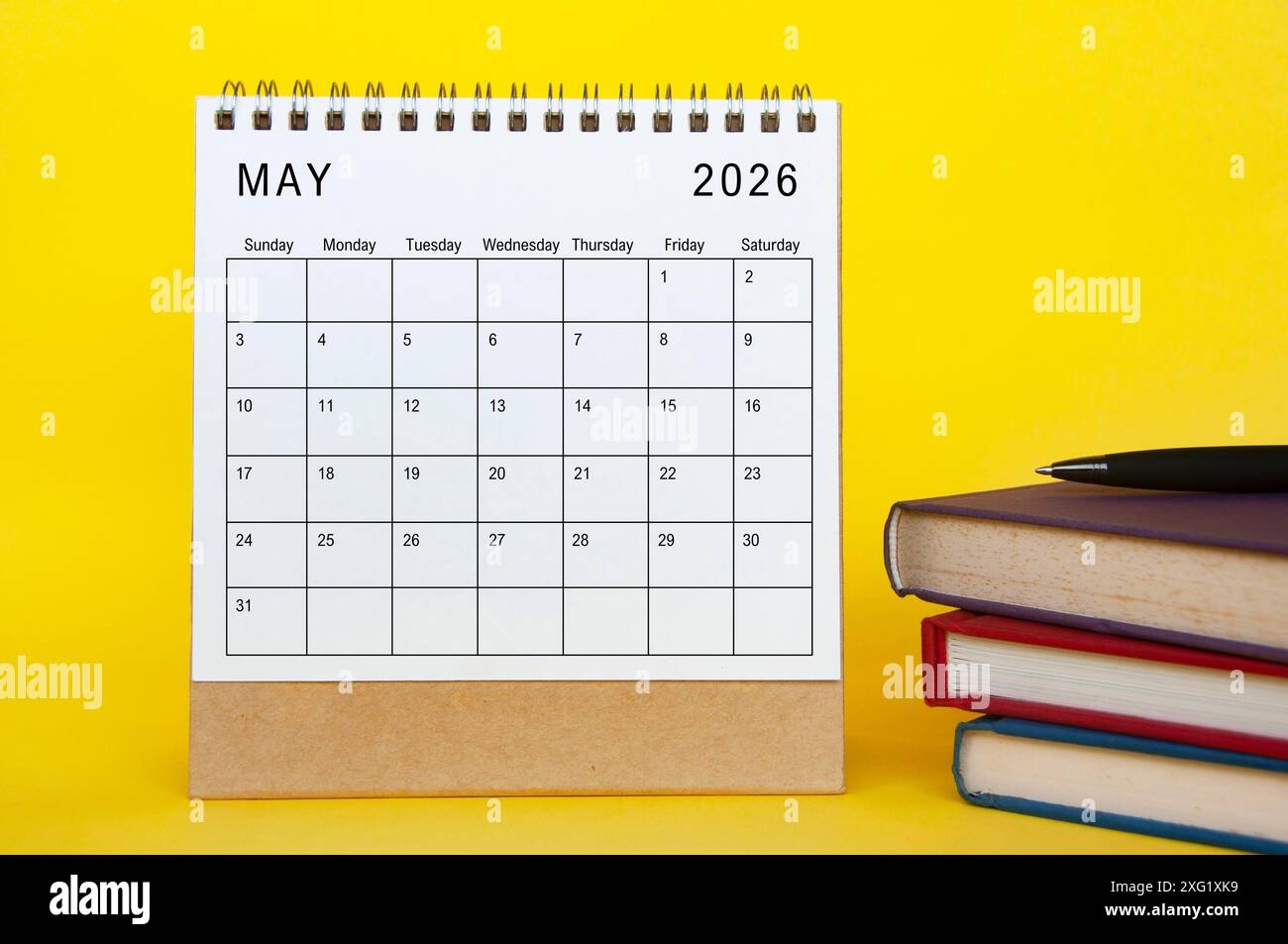 May 2026 Calendar With Yellow Cover Background And Books New Month And Calendar Concept Stock Photo Alamy